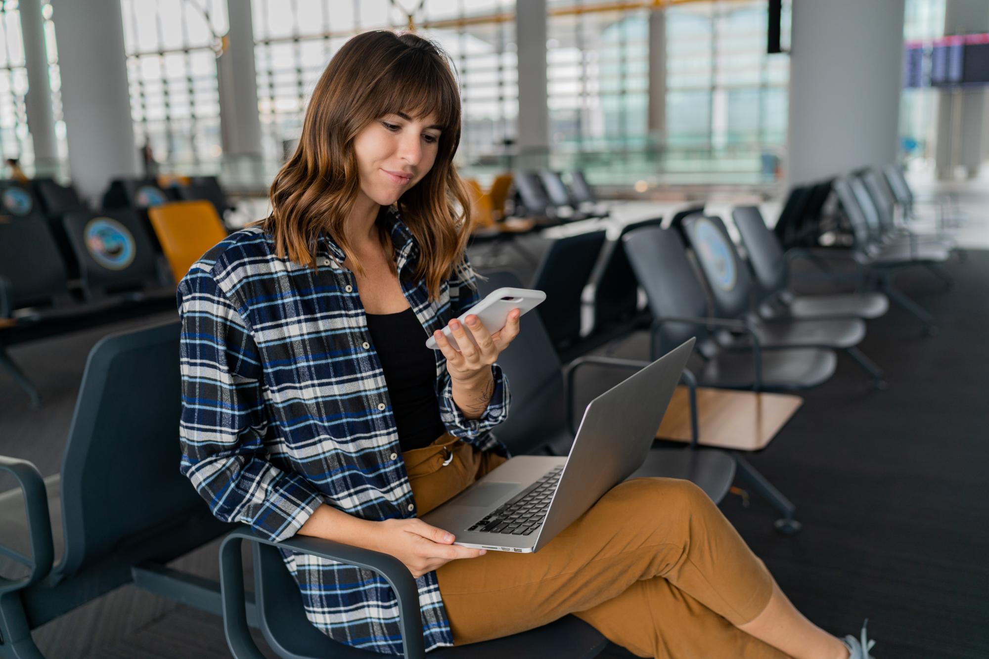 Travelers at an airport check-in desk